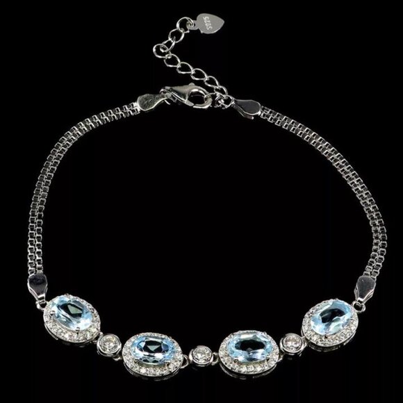 NWT 14K WHITE GOLD Oval Sky Blue Topaz Bracelet 8 Ins - Picture 2 of 5